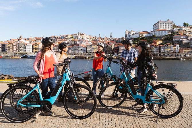 Porto: 3-Hour Old Town & Riverside Bike Tour - Guided Experience - First stop: bikes, helmets, and why the setup matters