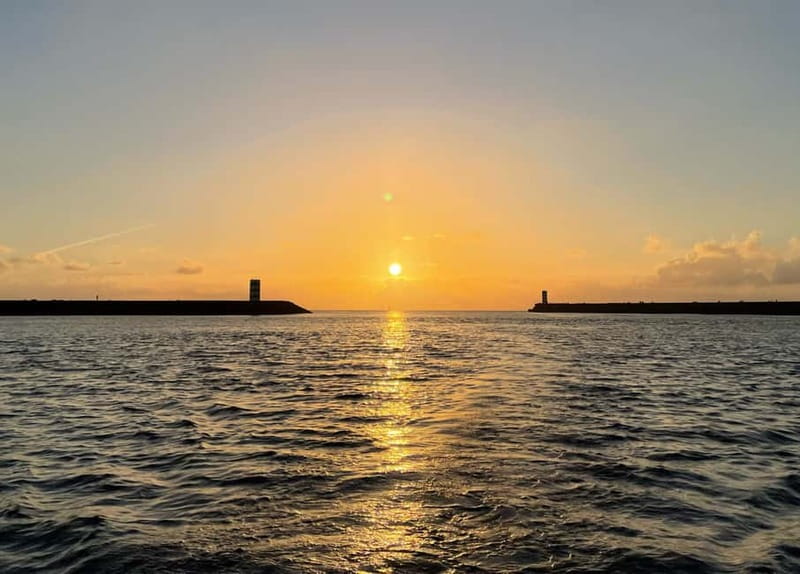 Porto: Best Charming Sailboat Cruise Sunset - Foz do Douro at sunset: photo stop energy, wind, and the swim option