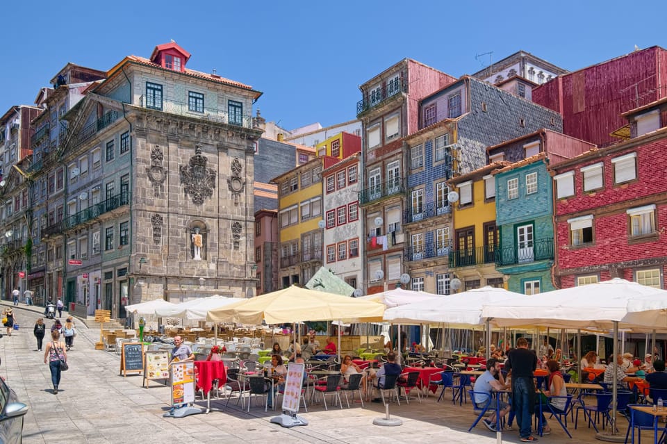Porto City Full Day Minibus Tour, Wine Tasting & Six Brigdes - Batalha Square to Vila Nova de Gaia: When Porto Switches Sides