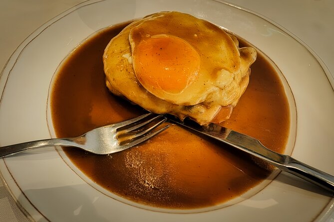 Porto Food Tour: 10 tastings at 5 restaurants & eateries - Francesinha at Praca D.Joao I: Porto’s famous, indulgent comfort food