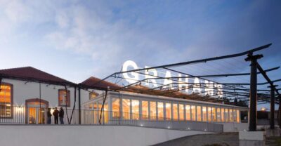 Porto: Graham's Port Lodge Tour & Vintage Room Wine Tasting - Step into the working cellar: pipes, vats, and how the place runs