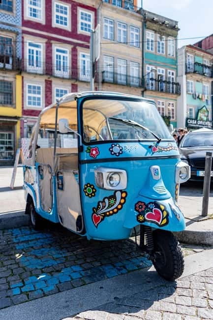 Porto: Historic Center Tuk-Tuk Tour - Meeting at Clérigos Tower: Blue Tuk-Tuks and a Quick Start