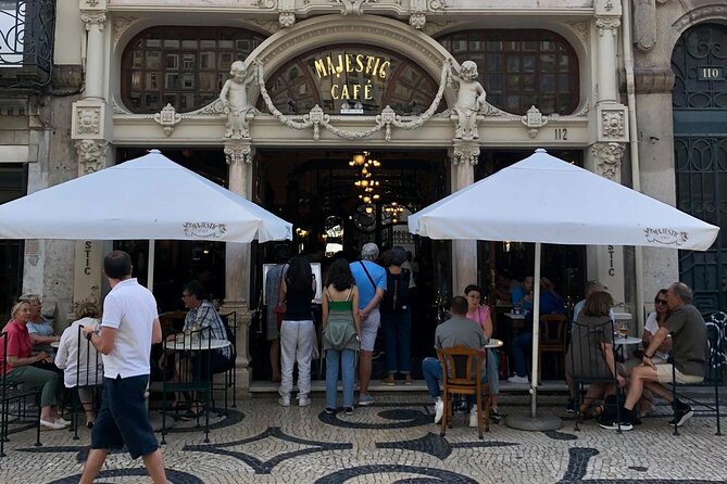 Porto Private Gourmet Food & Wine Historic Tour with a Sommelière - Avenida dos Aliados: Art Nouveau Faces in the City Center