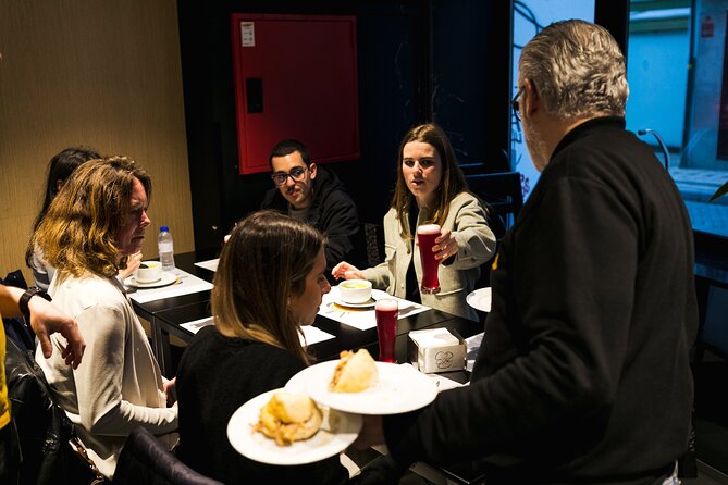 Porto Progressive Dinner Tour with Eating Europe - Caldo Verde and cold beer in the hands of two brothers