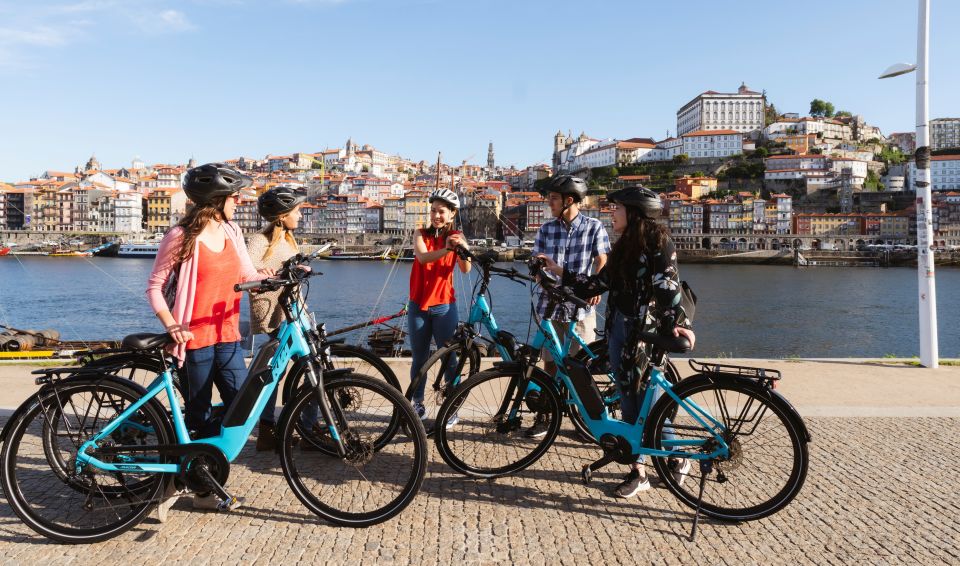 Porto: Riverside Panoramic E-Bike Tour - Ribeira Square and Miragaia: quick stops that set the whole context