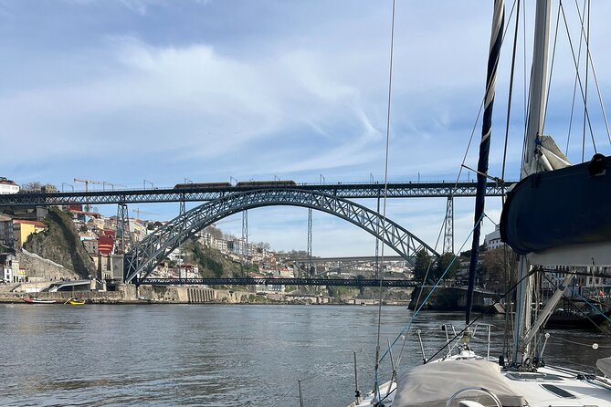 Porto Sunset River Cruise: Douro Magic at Dusk - Dom Luís I Bridge views from below: the Porto side of the wine story
