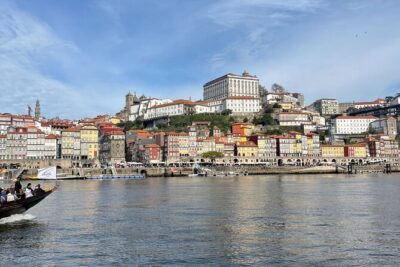 Porto Sunset River Cruise: Douro Magic at Dusk - Ribeira do Porto from the water: Alfândega and the customs-house feel