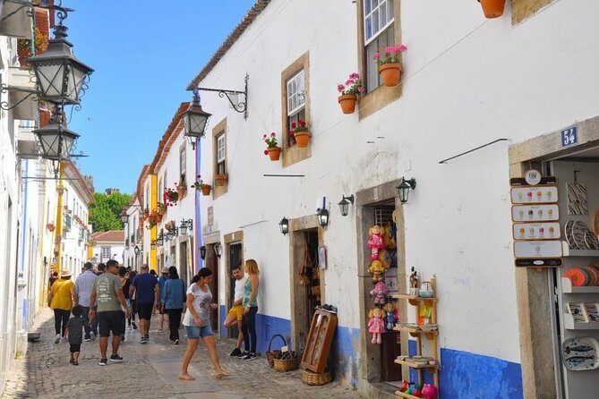 Porto to Lisbon with stop Aveiro-Fátima-Coimbra-Tomar-Nazaré-Óbidos - Why This Porto to Lisbon Route Works Better Than Trains