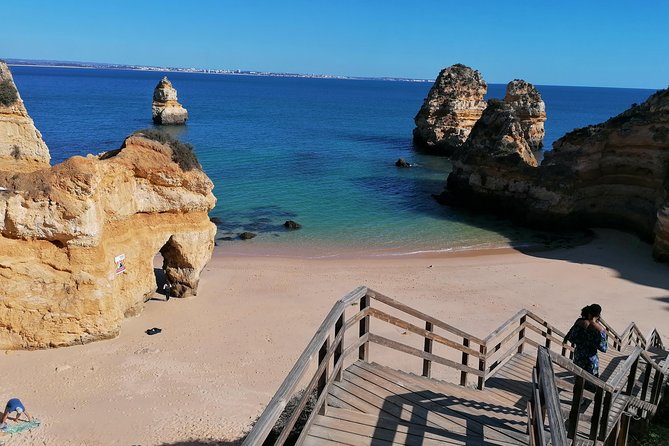 Private Algarve: Benagil Caves, Lagos Cliffs & Hidden Beaches - Praia da Marinha: wooden stairs, swim time, and cliff-postcard views