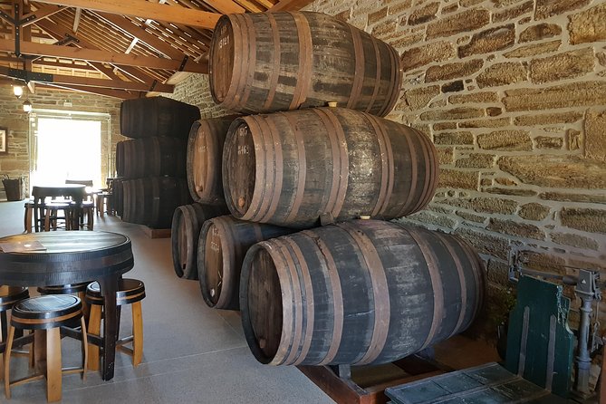 Private Douro Valley visit to three vineyards with Lunch from Porto - Sabrosa winery lunch: traditional Portuguese meal, 4 courses, and red-and-white pairings