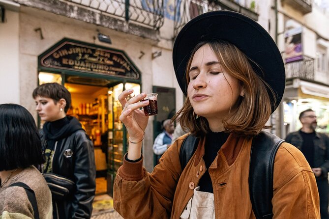 Private Night Bar Crawl in Lisbon with Local Guide and Drinks - Stop 2: Bairro Alto’s bar scene, red-light history, and a luck statue