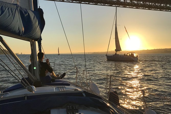 Private Sunset Sailing cruise from Lisbon - Champagne, music, and a real romantic bubble