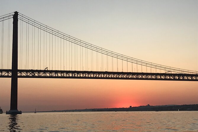 Romantic Sunset Sailing Experience in Lisbon - Wine, jackets, and the onboard tone you’ll actually enjoy