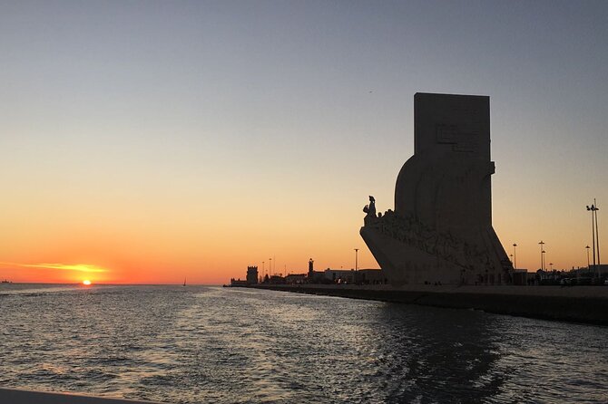 Sailboat Tour in Lisbon with drinks included | Morning and Sunset - Torre de Belém and Jerónimos glow at dusk: the real highlight