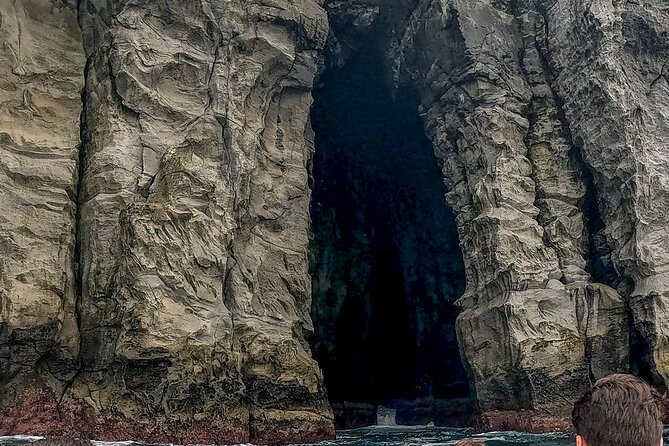 San Miguel: Boat Tour – Volcanic Wonders, Caves & History - Santa Bárbara black sand and Praia dos Moinhos calm-water vibes