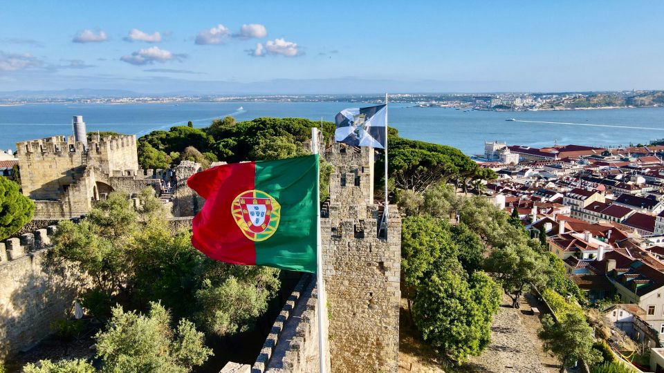 São Jorge Castle Skip-the-line Entry Ticket - The tuk tuk transfer (if you choose it): easy uphill, quick Lisbon context