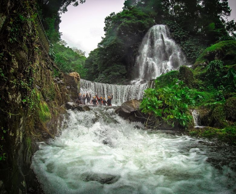 Sao Miguel: Caldeiroes Canyoning Experience - The fun part: optional jumps, a natural slide, and abseils