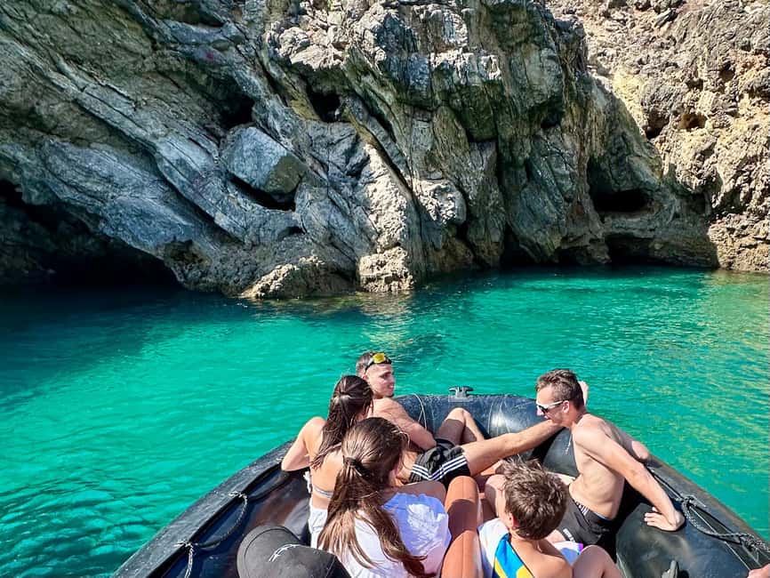 Sesimbra: Caves & Secret Beaches - Swim break and regional liquor: the best kind of pause