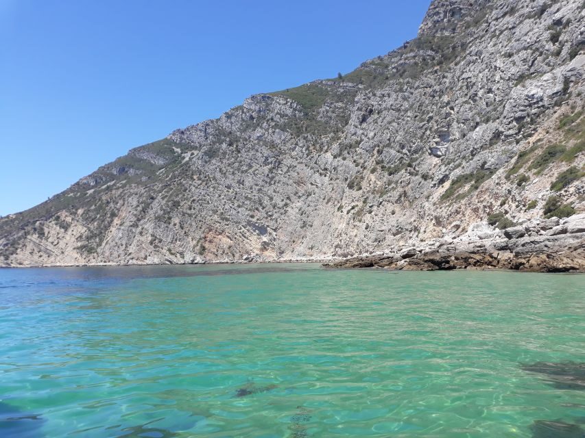 Sesimbra: Secret Bays and Beaches Boat Tour with Snorkeling - Praia da Cova: Photo Stop Energy With a Real Swim Window