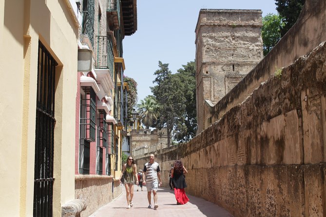 Seville Day Trip from the Algarve - Santa Cruz on foot: whitewashed streets and tapas energy