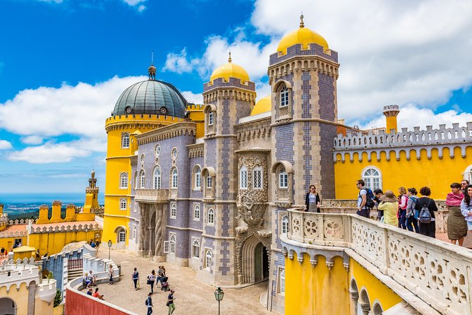 Sintra and Cascais Small Group Tour with Hotel Pick up & Ticket - The drive past Cascais beaches and Praia do Guincho