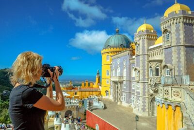 Sintra and Cascais Small Group Tour with Hotel Pick up & Ticket - Stop 1: Pena Palace and the Sintra peak you can’t unsee