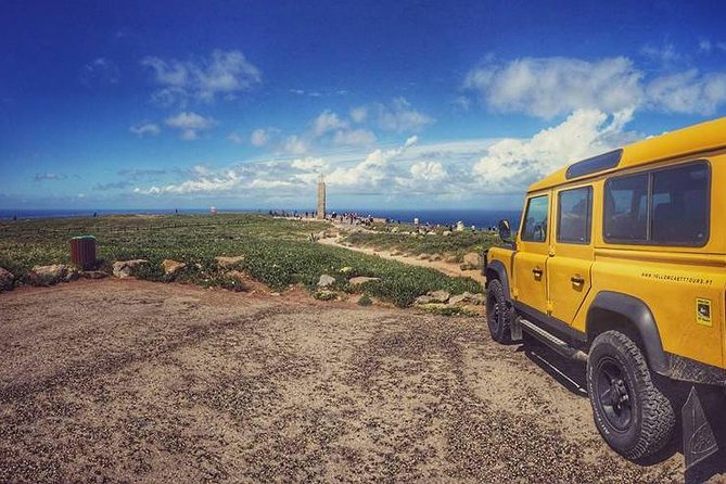 Sintra Cascais 4x4 Land Rover Photo Panoramic Private Tour - Guincho Beach: dunes, cliffs, and water-sport energy