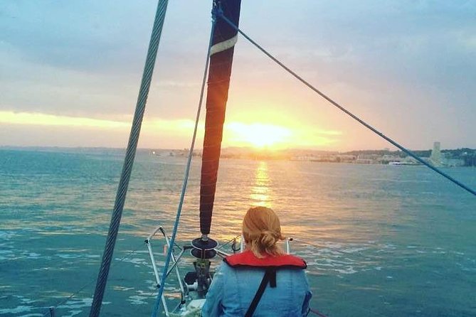 Sunset Sailing Tour On The Tagus River - Drinks, snacks, and the simple decision-making onboard
