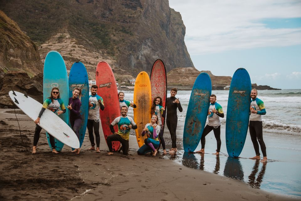 Surf lesson in Madeira - Warm-up, boards, and wet suits before you get swamped
