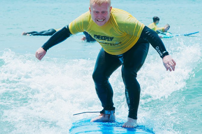 Surf Lesson on Praia de Carcavelos - Breaks on sun loungers: why rest is part of learning