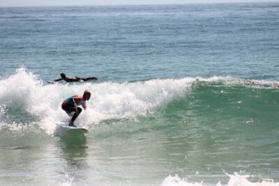 Surf lessons in the Algarve - Bordeira Beach session: sand drills, safety, and catching real waves