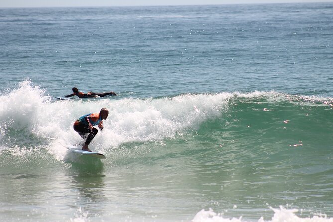 Surf lessons in the Algarve - Bordeira Beach session: sand drills, safety, and catching real waves