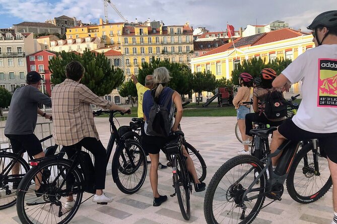 The Heart of Lisbon by Electric Bike - Feira da Ladra area: market-day energy plus Tagus-and-monument views