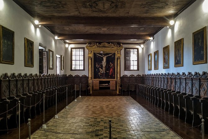The Mysteries of Funchal Walking Tour - Stop 1: Holy Trinity Church and Life Beyond the Postcard