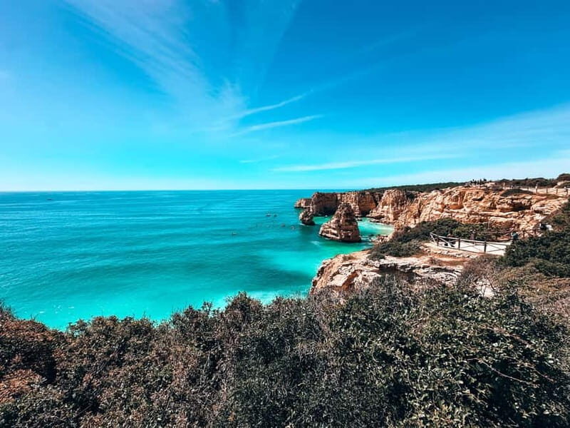 The Original 7 Hanging Valleys Guided Hike With Pickup - Praia da Marinha: famous formations and cave views at the end