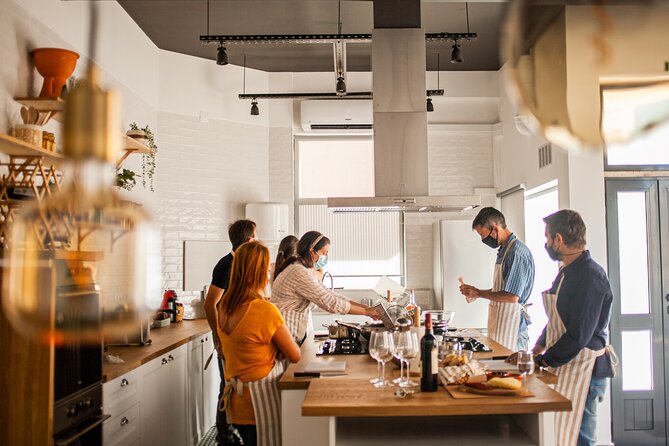 Traditional Portuguese Cooking Class in Lisbon - The 3-hour flow: finger foods, cooking stations, and a family-style meal