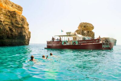 Vilamoura: Benagil Cave Boat Trip with Beach BBQ and Kayak - The cruise to Benagil: Algarve coast views with actual guidance