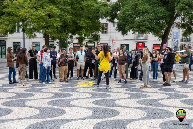 Walk Lisbon Like a Local: Bairro Alto & Downtown Experience - Bairro Alto: walls, plague, and Saint Roque in the same neighborhood