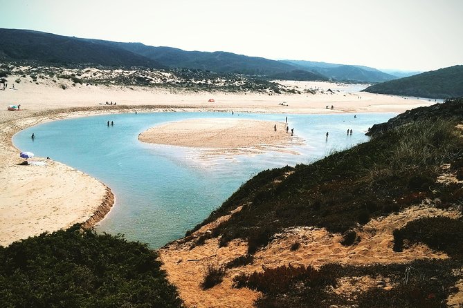 Wild and Wonderful West Coast Full Day Tour - Amado Beach: red cliffs and big-wave energy